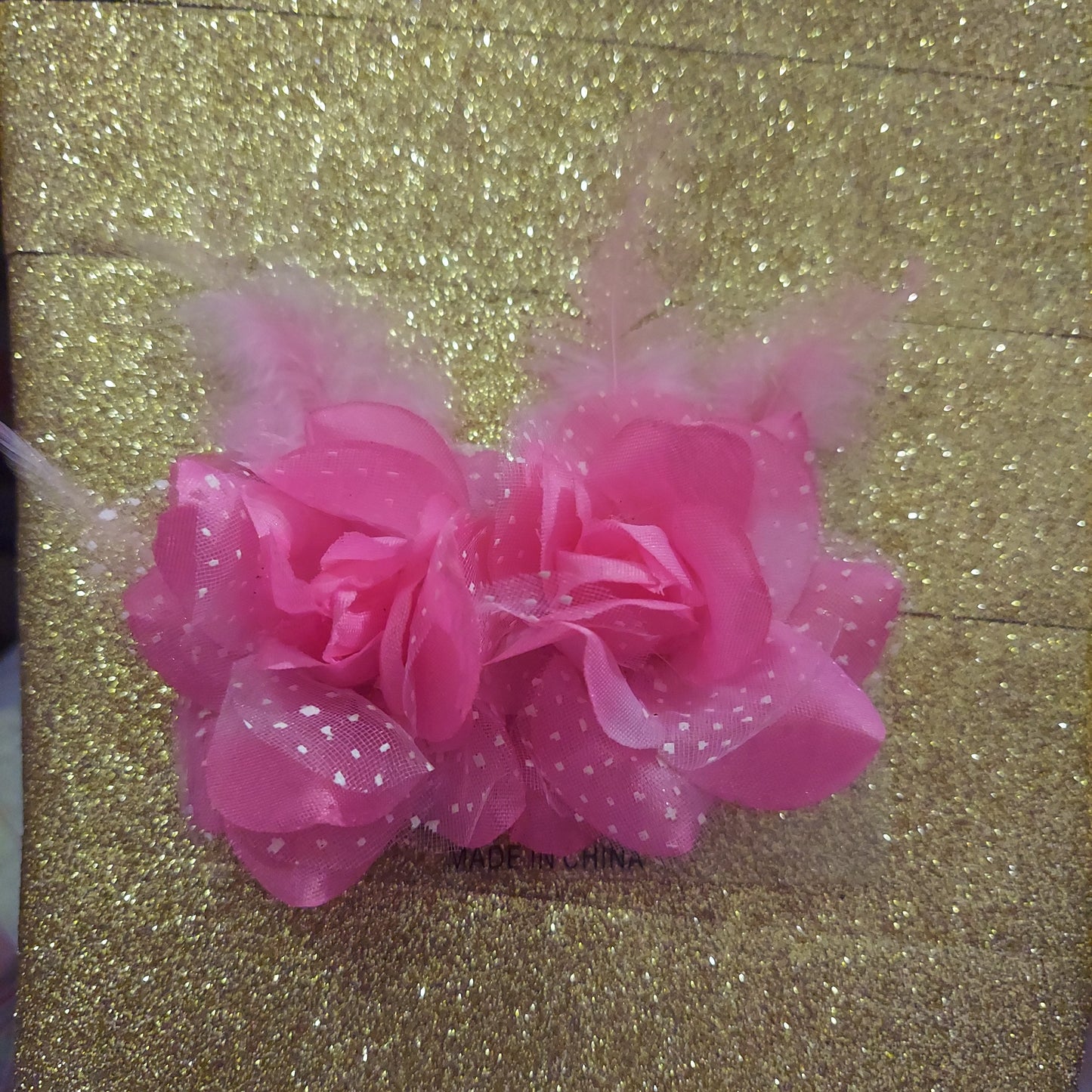Flor con plumas bow set