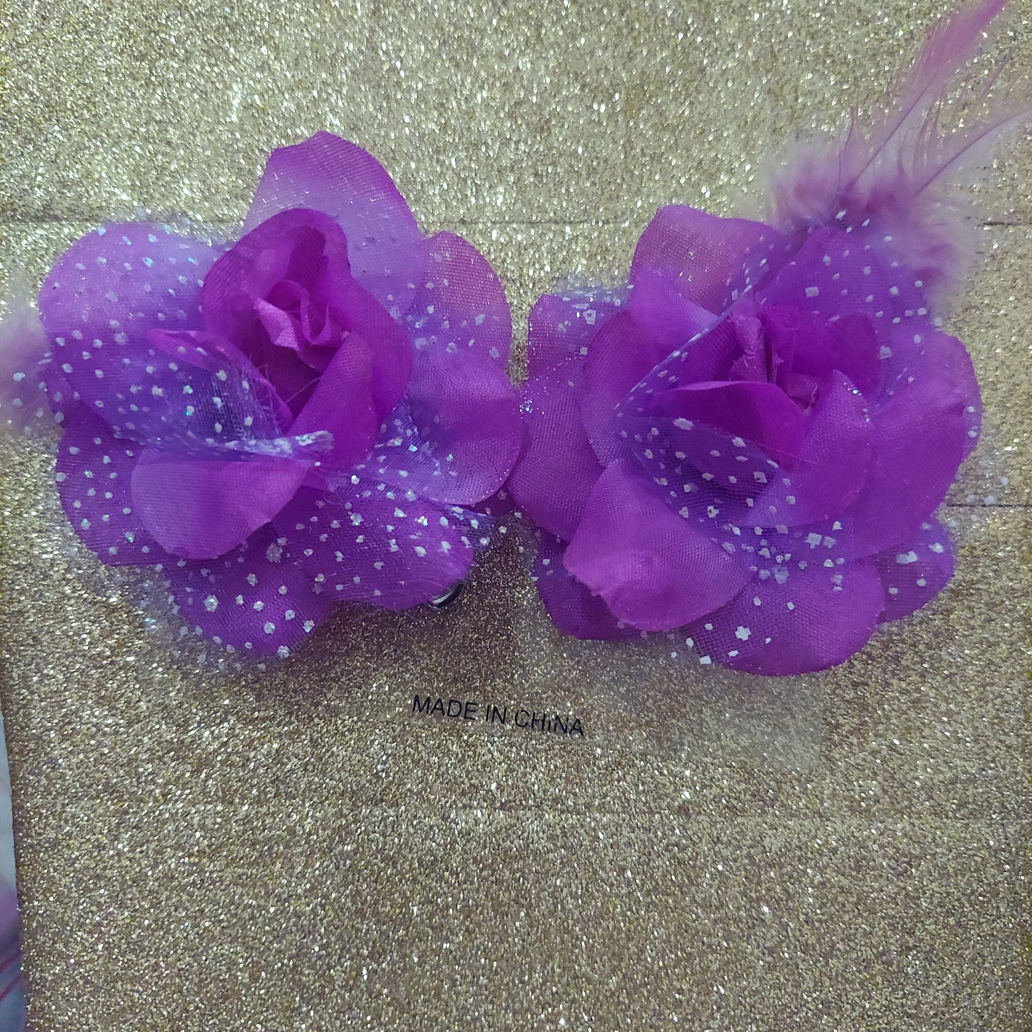 Flor con plumas bow set