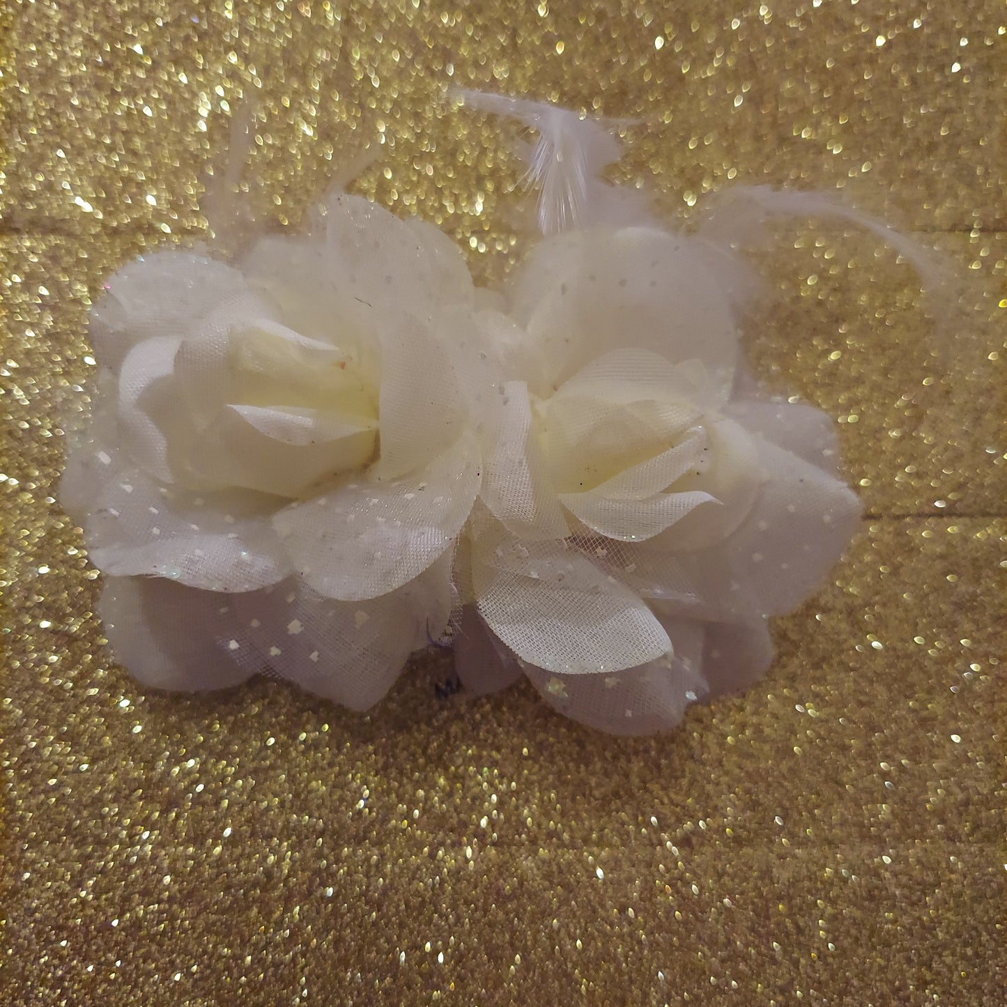 Flor con plumas bow set
