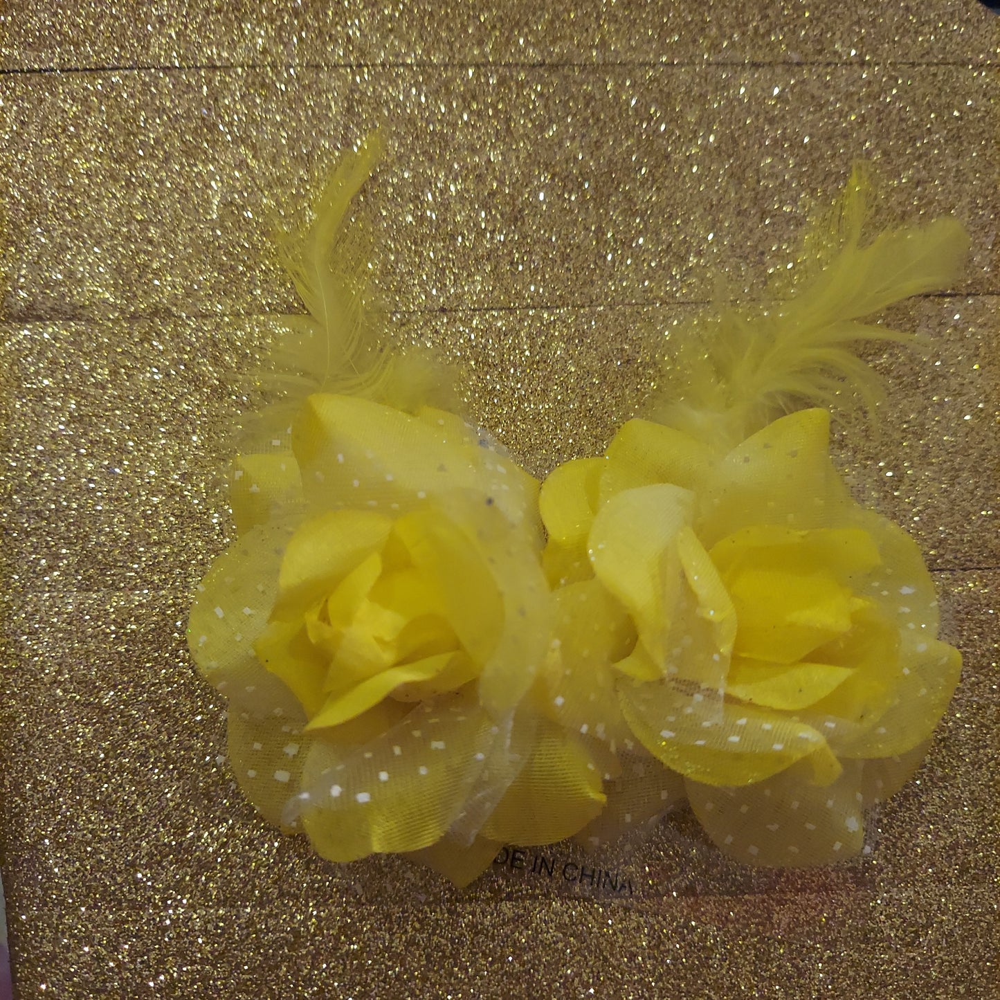 Flor con plumas bow set