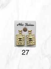 Load image into Gallery viewer, Inspired earrings of Cc