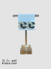 Load image into Gallery viewer, Inspired earrings of Cc